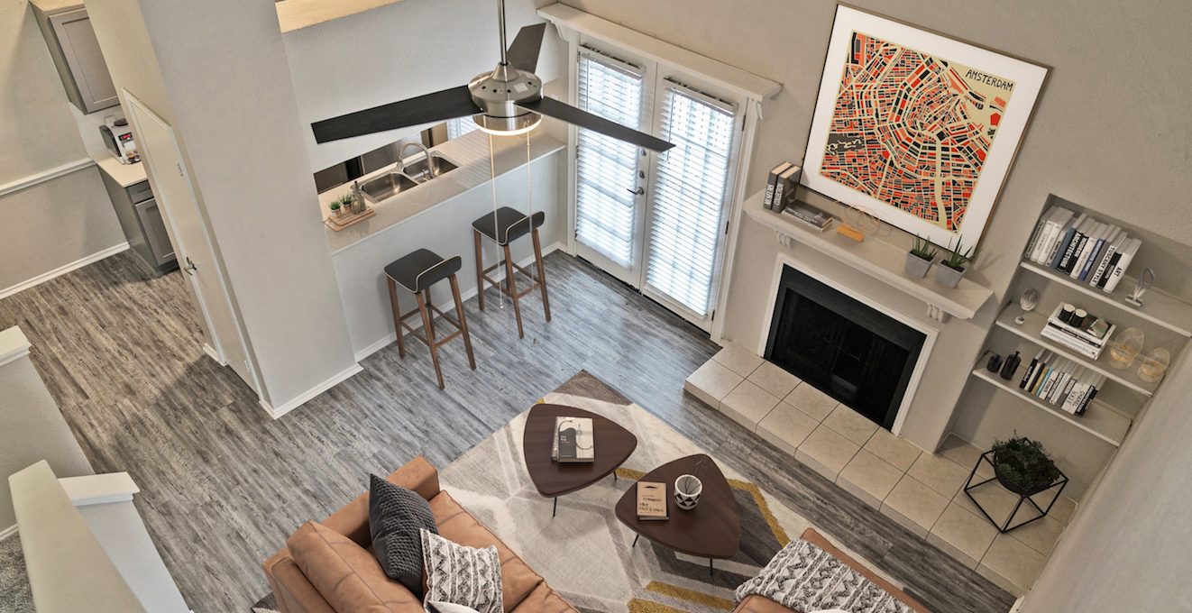 a view of a living room and kitchen from above at The Westmount at River Park