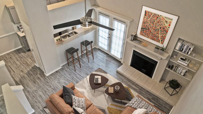 a view of a living room and kitchen from above at The Westmount at River Park