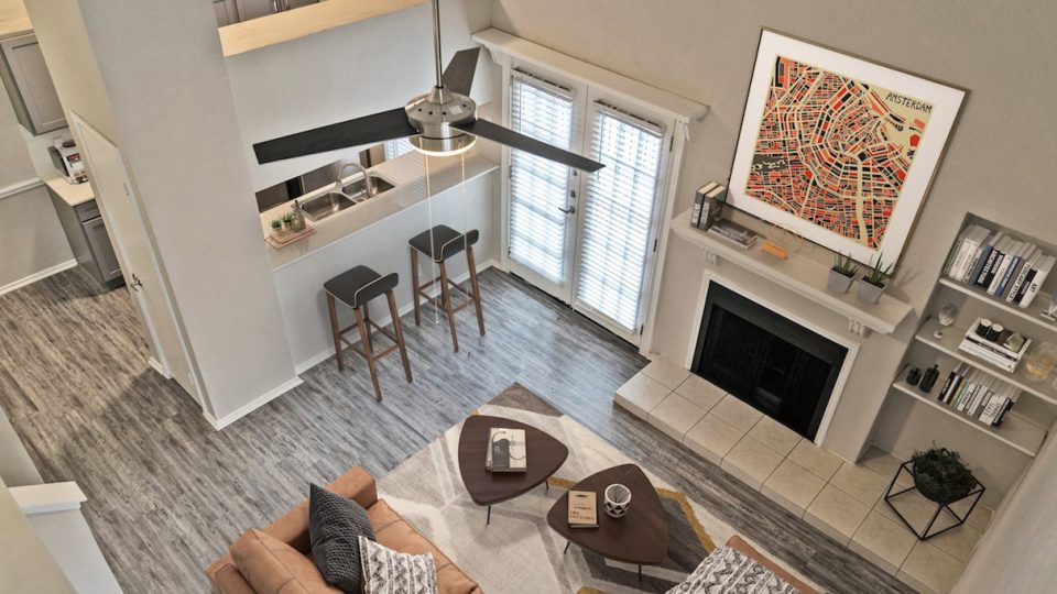 a view of a living room and kitchen from above at The Westmount at River Park