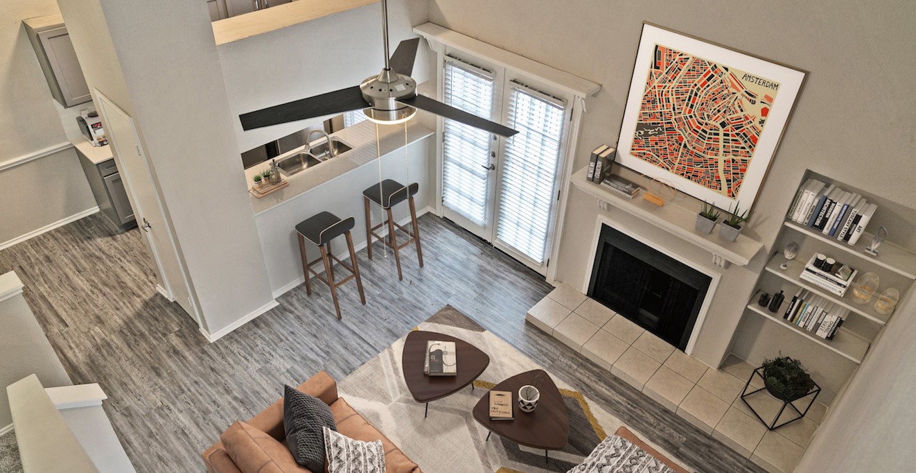 a view of a living room and kitchen from above at The Westmount at River Park